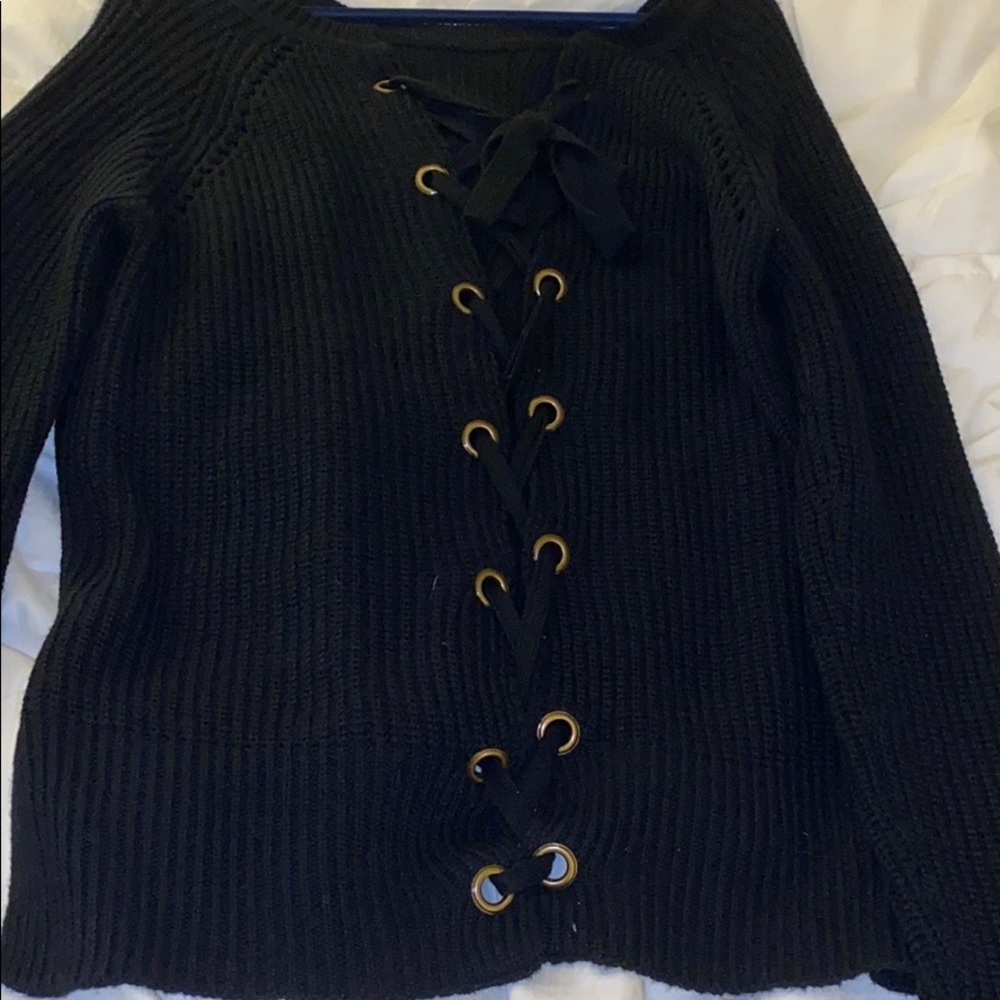 Black sweater with lace up design on back
